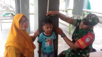 Peduli Akan Kesehatan Masyarakat, Sertu Said Ali Dampingi Giat Posyandu Balita