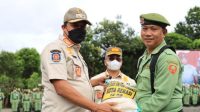 Plt. Wali Kota Pimpin Apel Akbar Anggota Satlinmas Kota Bekasi Tahun 2022